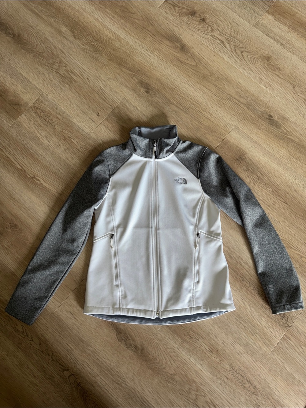 The North Face Women’s White Body with Gray Sleeves Softshell Jacket. Size M.